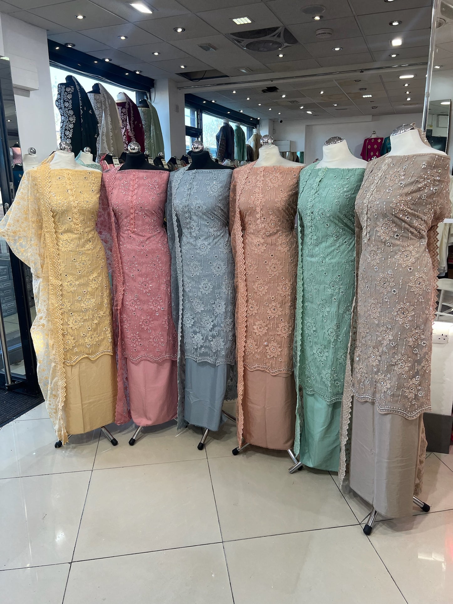 Party‑Wear Net Suits with Lace & Thread‑Embroidered Dupatta