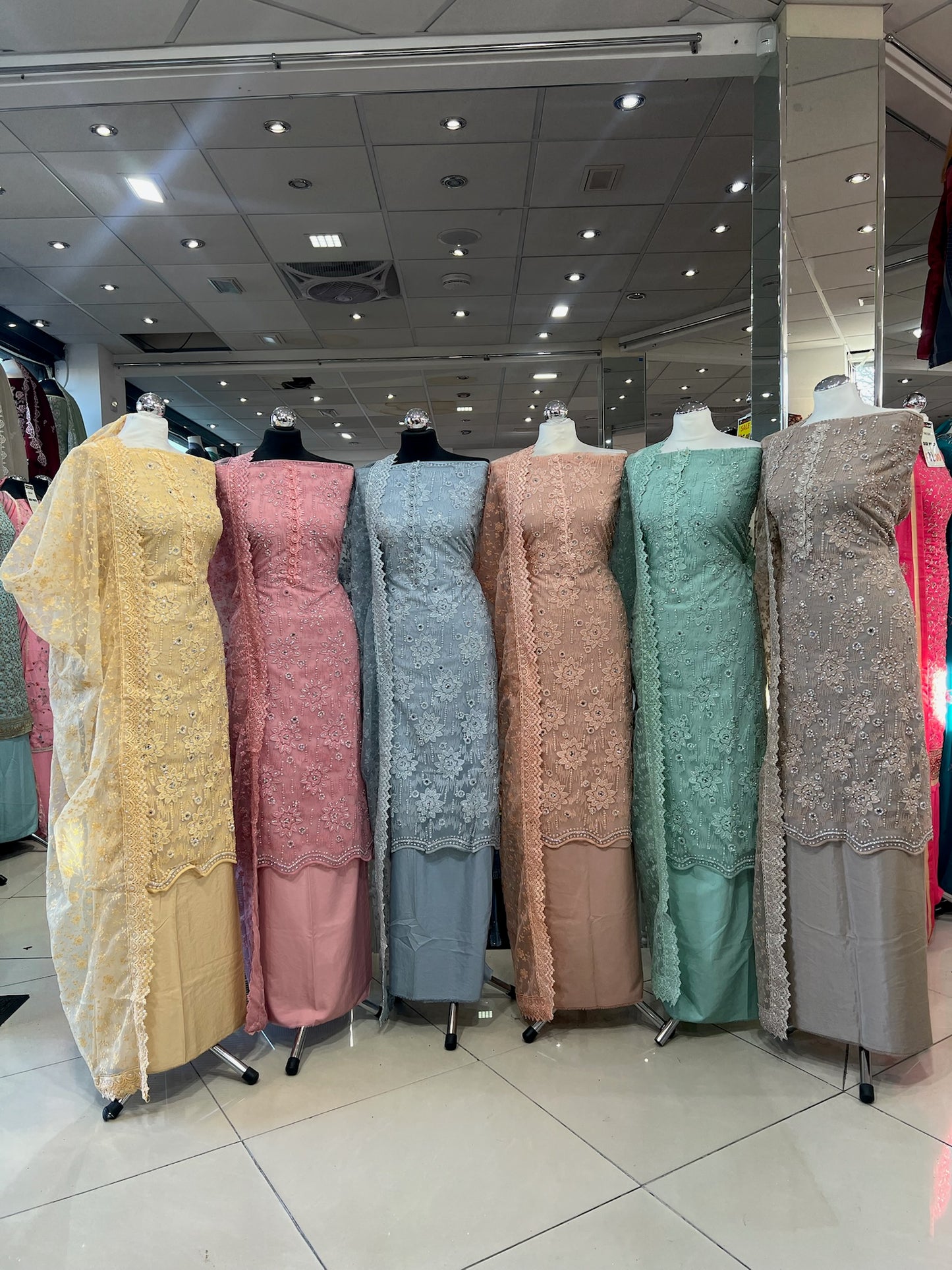Party‑Wear Net Suits with Lace & Thread‑Embroidered Dupatta