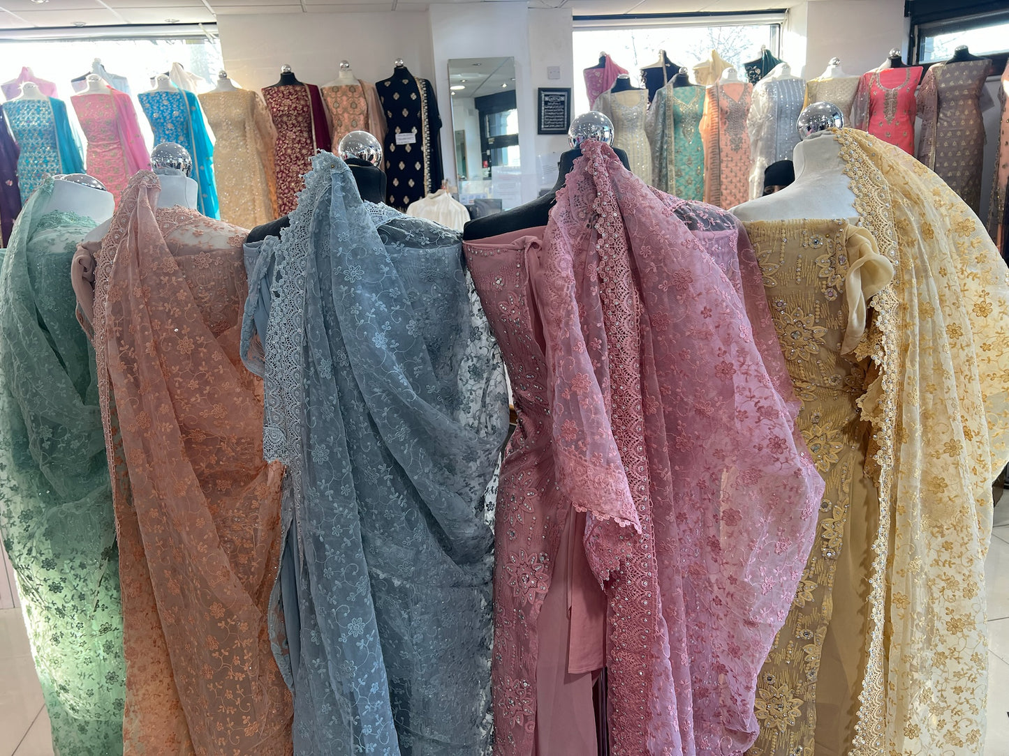 Party‑Wear Net Suits with Lace & Thread‑Embroidered Dupatta